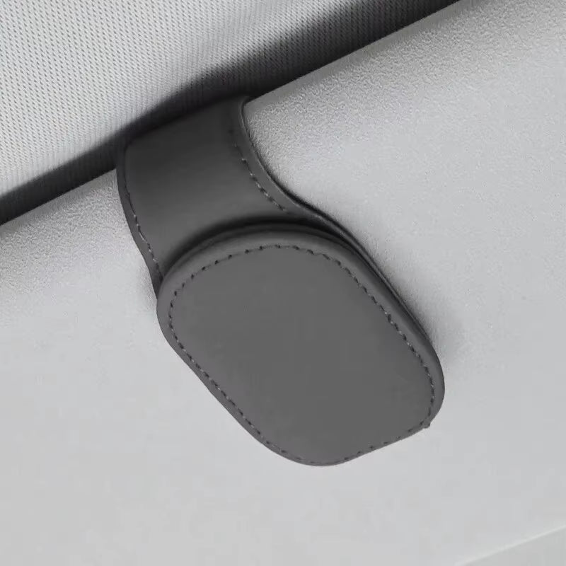 Elevate Your Drive with Our Universal Car Sun Visor Eyeglass Hanger Clip – Premium Leather Magnetic Glasses Holder for Smart Automobile Storage