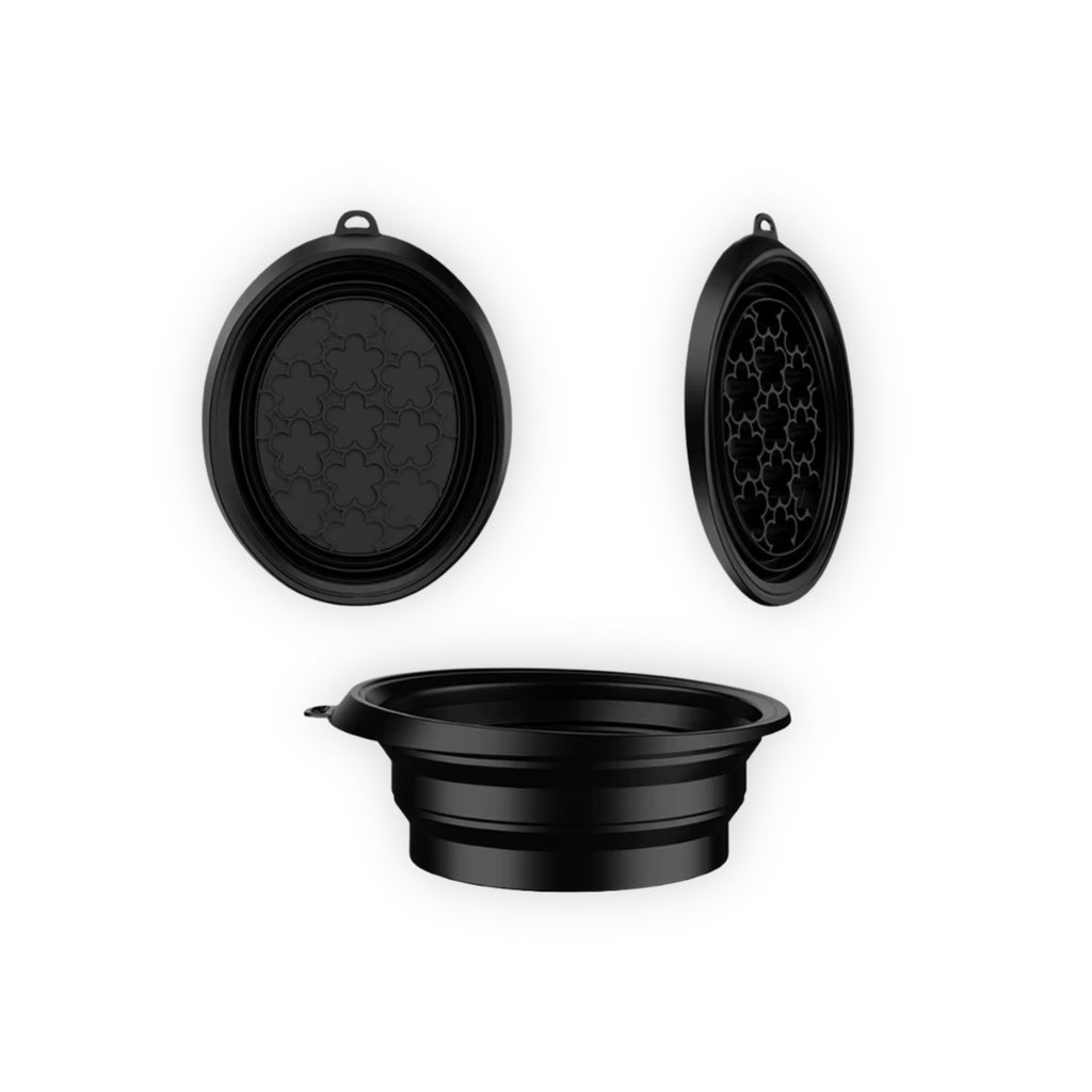 Black collapsible travel mug with lid on a white background